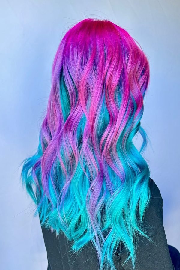 Mermaid waves blending pink and teal hair colour