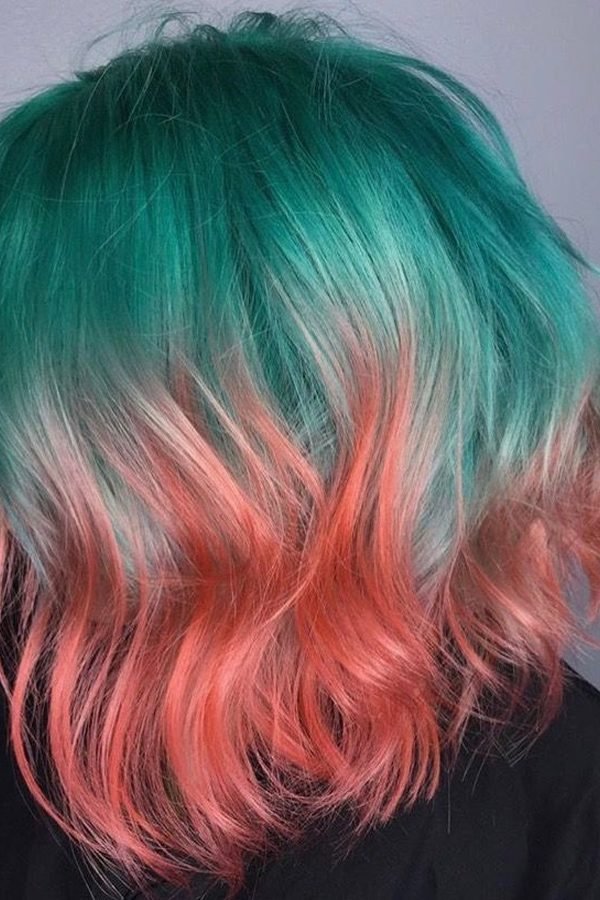 Teal and coral pink split bob haircut