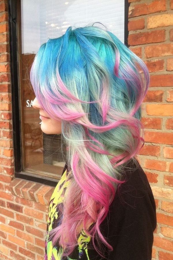 Pastel pink and teal hair in a side-swept style