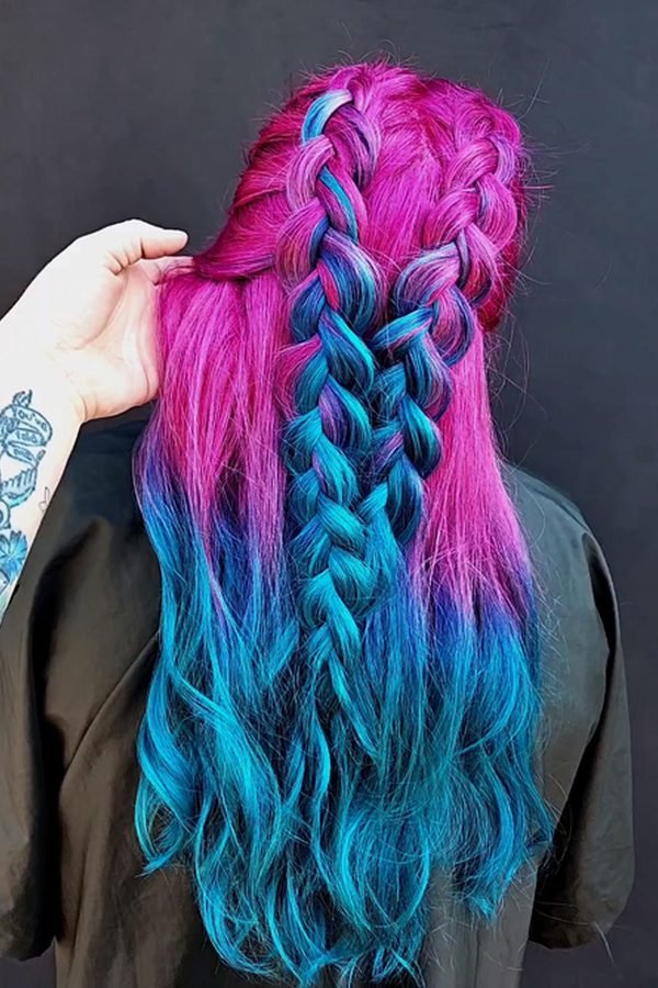 Fishtail braid weaving hot pink and teal hair