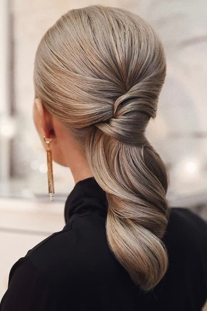 Low twisted ponytail hairstyle for a winter formal