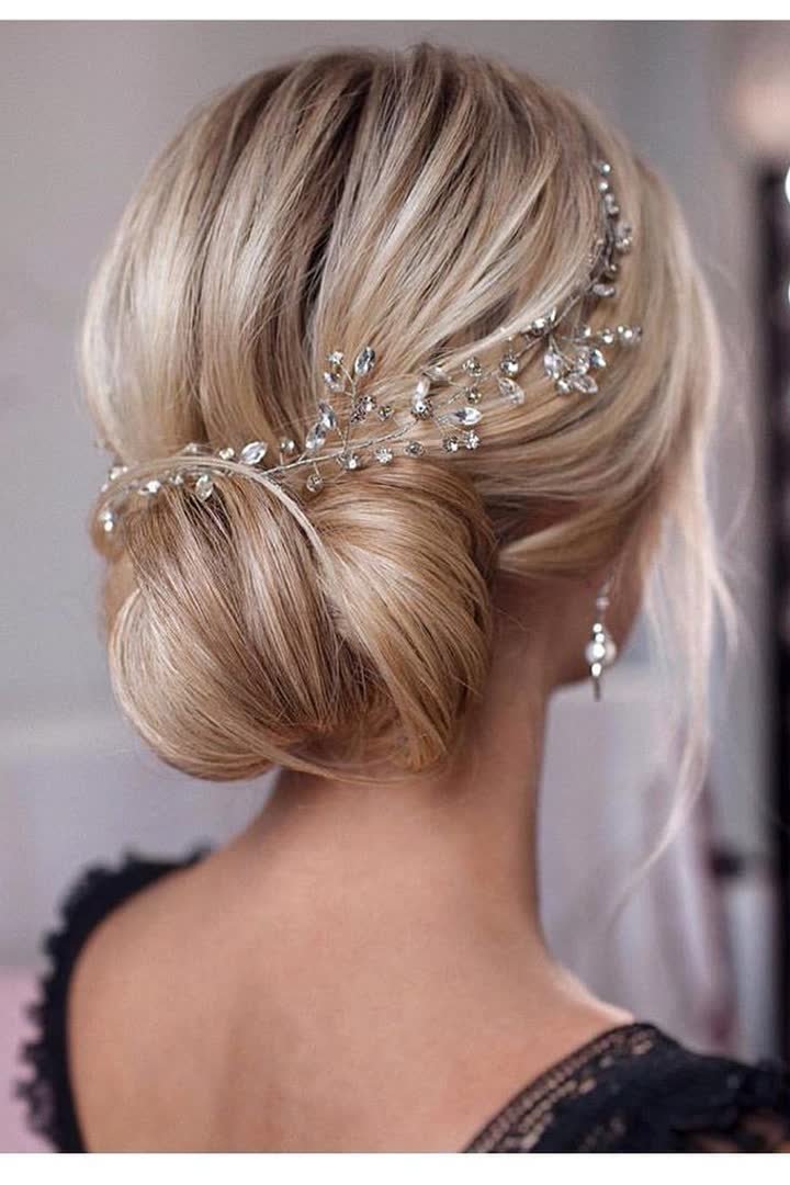 Twisted updo with crystal pins for a winter formal